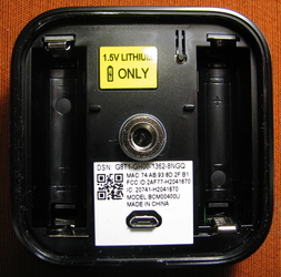 Inside the camera battery compartment