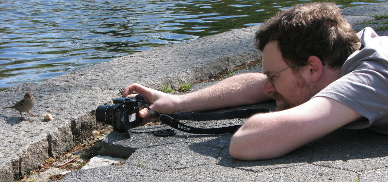 Photo of Tim photographing a bird